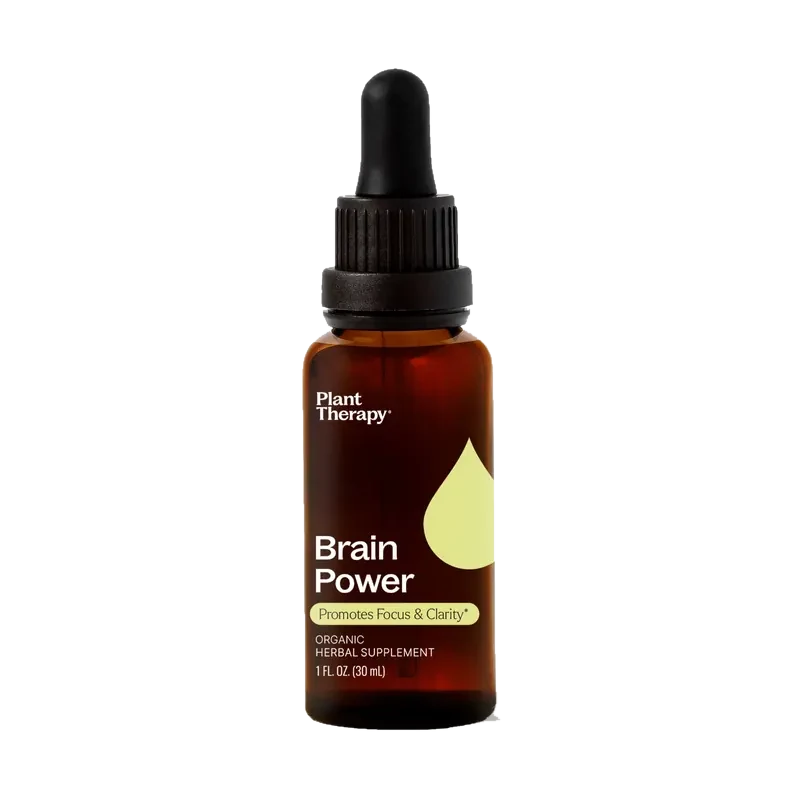 A one-ounce amber glass bottle of Plant Therapy Brain Power with a black cap and glass pipette